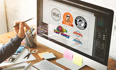 Person reviewing Logo on computer screen