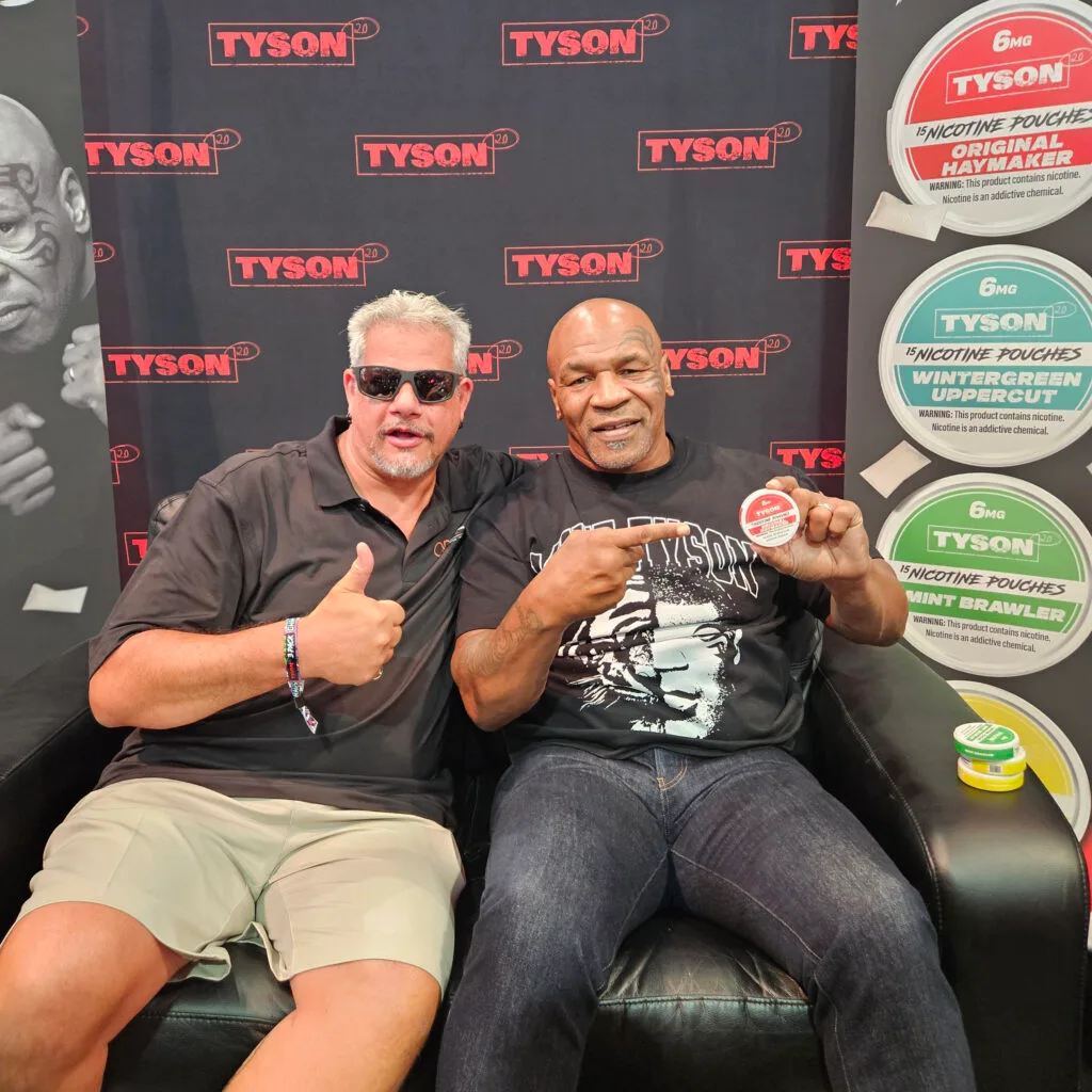 Alfred sitting with Mike Tyson